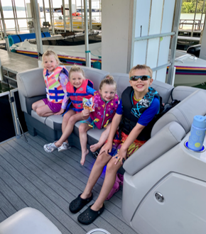 kids on boat deck on Table Rock Lake
