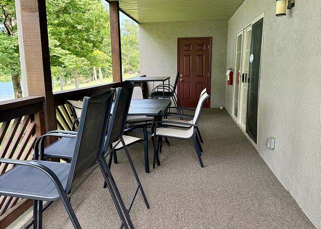 Private covered deck dining area at Condo A-1