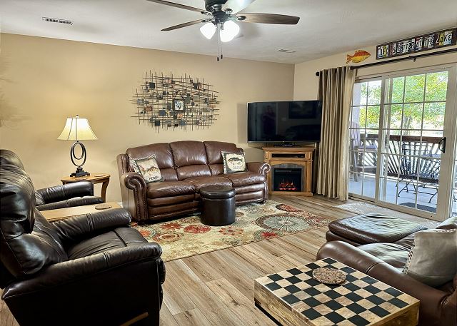 Living room entertainment area in Condo A-3
