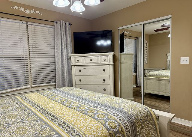 Condo A-3 king bedroom with television