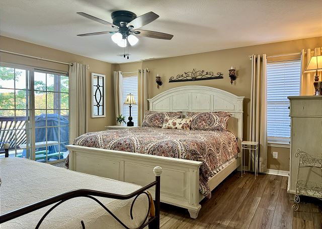 Queen bedroom with deck access in Condo A-3