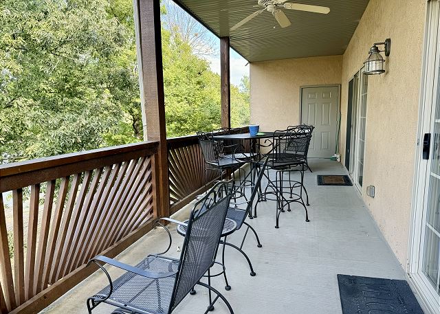 Covered private deck seating at Condo A-4