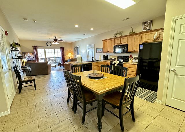 Open kitchen and dining space in Condo A-4