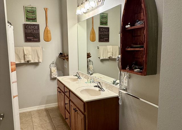 Guest bathroom vanity in Condo A-6