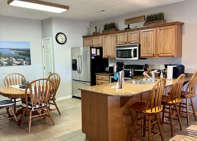 Kitchen breakfast bar seating in Condo A-6