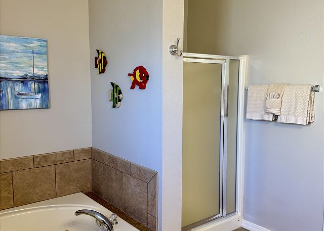 Primary bathroom walk-in shower in Condo A-6