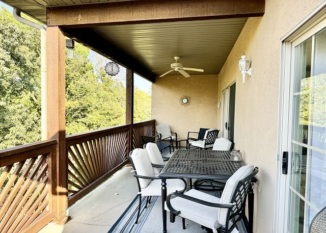Private balcony dining area at Condo A-7