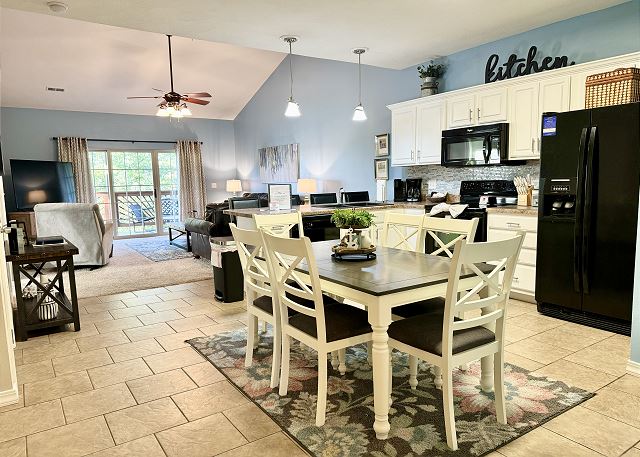 Open kitchen dining and living area in Condo A-7
