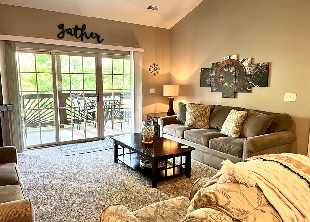 Living room overlooking the deck in Condo A-9