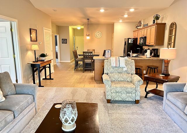 Open-concept living and dining room in Condo A-9