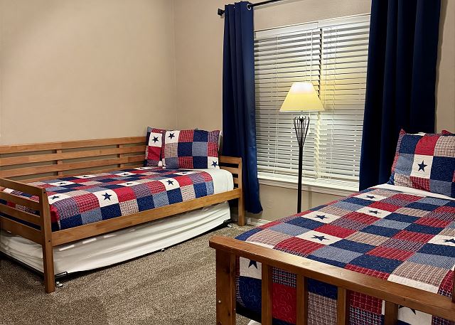Bedroom with four twin beds in Condo B-1
