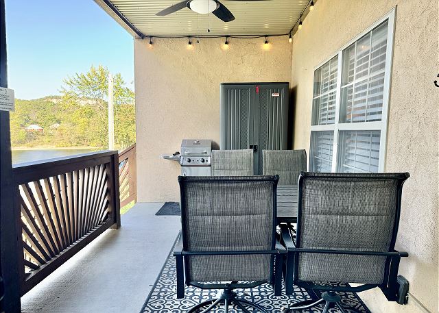 Covered deck seating and gas grill