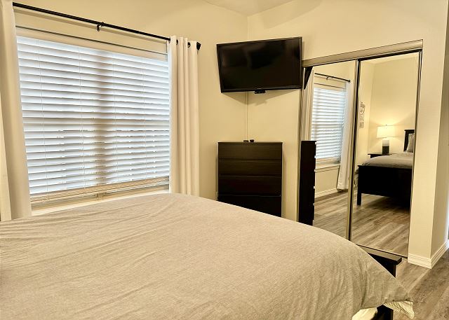 First queen bedroom with TV