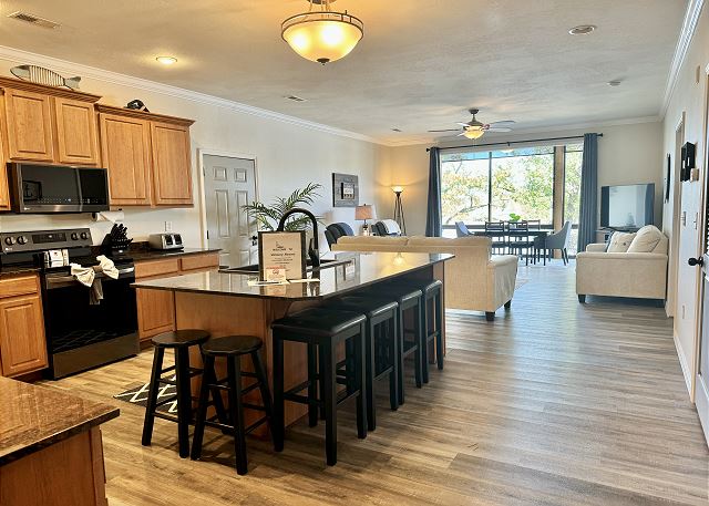 Open kitchen dining and living area in Condo B-2