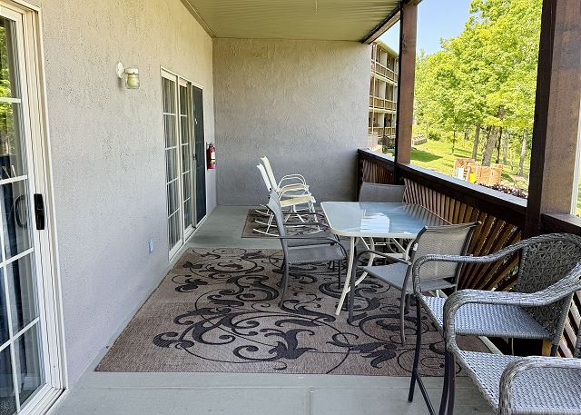 Covered deck seating at Condo B-3