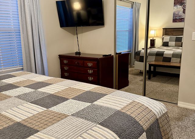 King bedroom with television