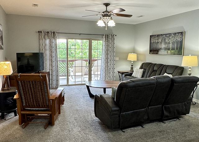 Living room opening to the covered deck