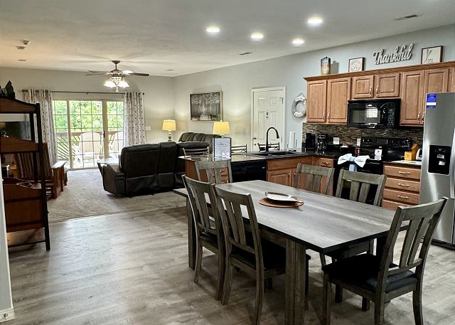 Open dining kitchen and living area inside Condo B-4