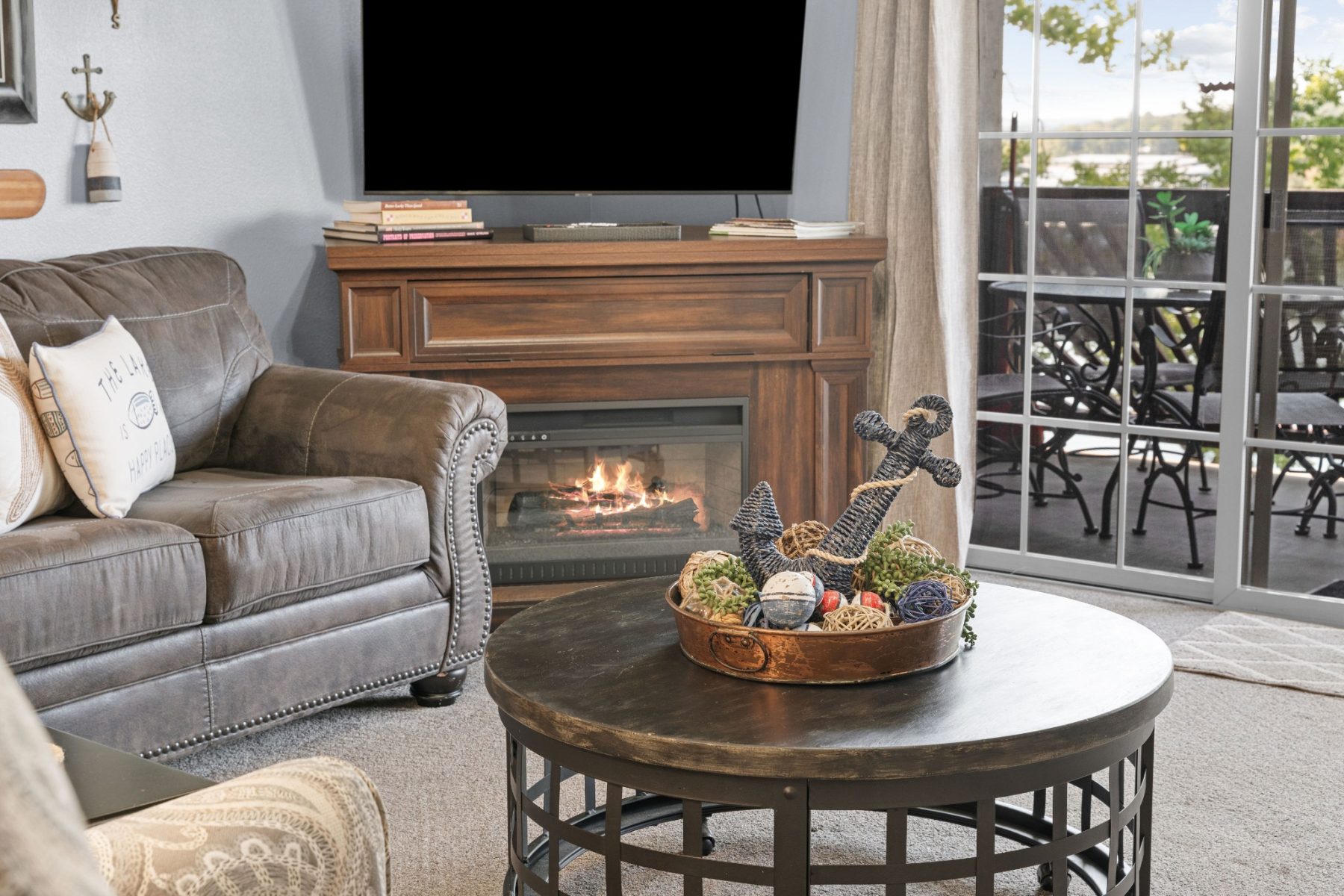 Comfortable living room with fireplace inside Condo B-5 at Vickery Resort