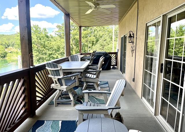 Covered deck dining area overlooking Table Rock Lake