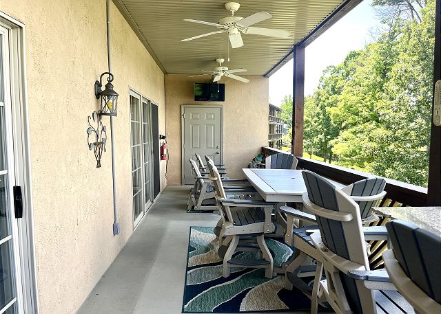 Covered deck seating at Condo B-6