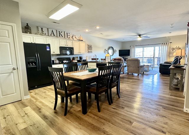 Open dining kitchen and living area in Condo B-6