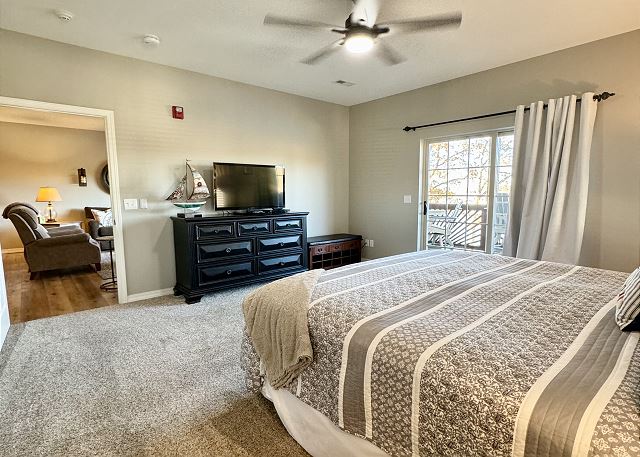 Primary bedroom with television