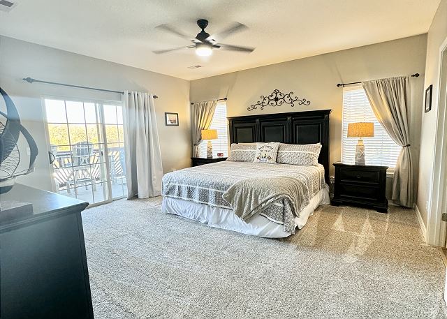 Primary king bedroom with deck access