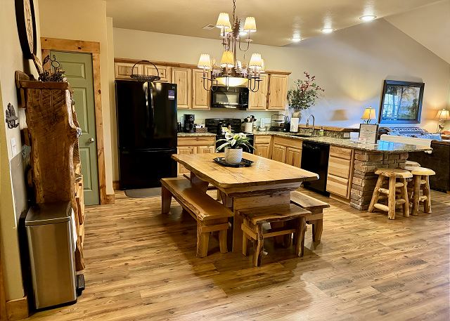 Full kitchen and dining table in Condo B-8