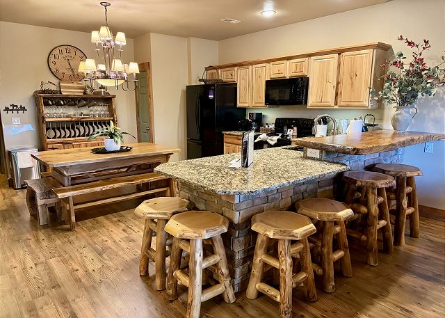 Kitchen breakfast bar and dining area in Condo B-8